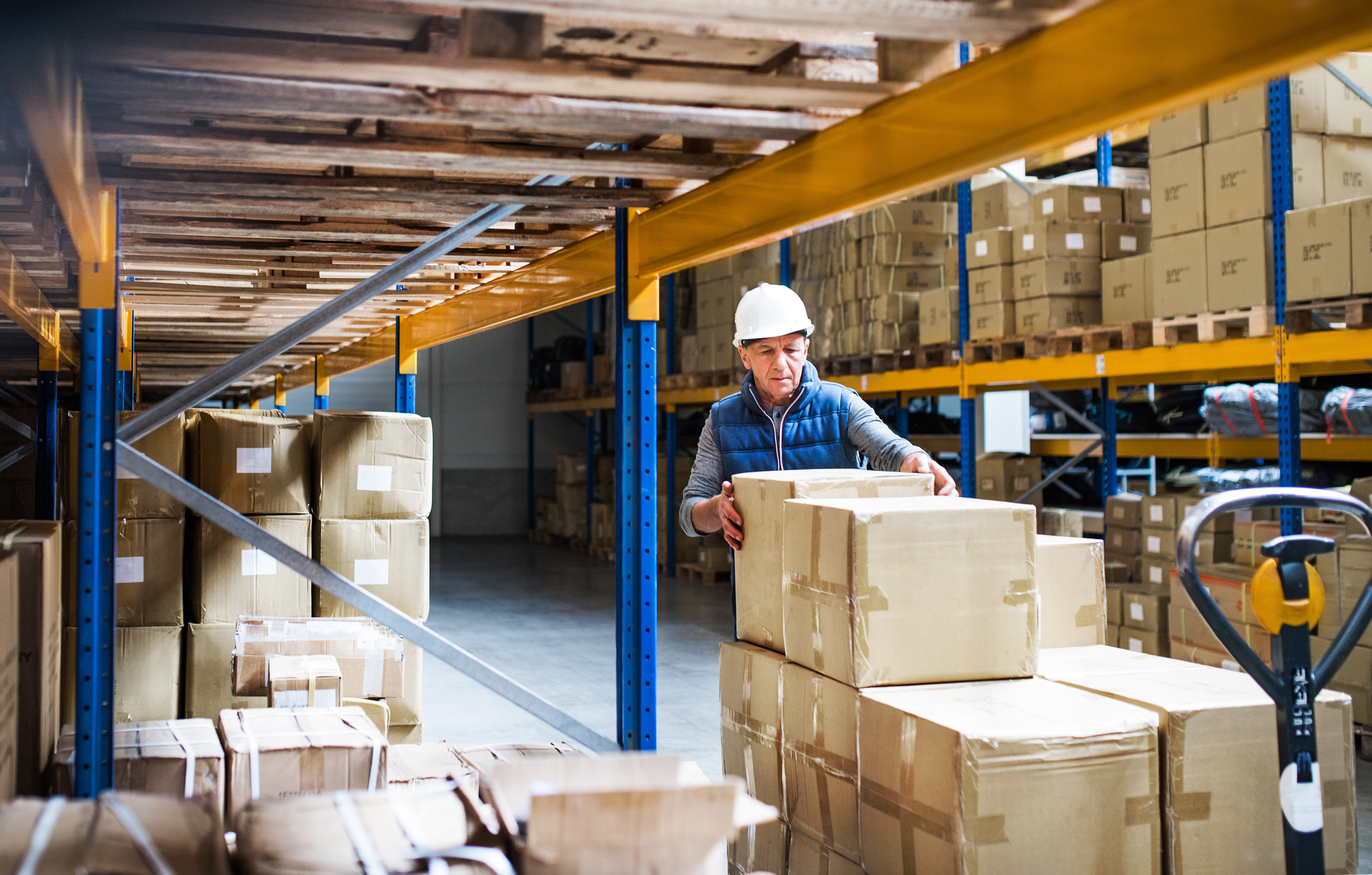 Warehouse interior with worker