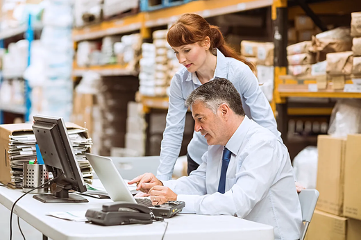 People looking at laptop